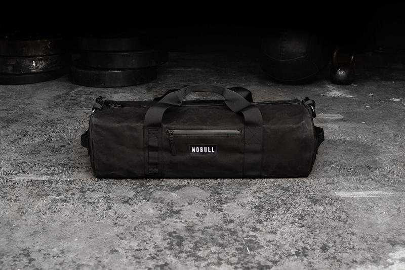 Men's Nobull Waxed Canvas Traditional Duffle Bags Black | SG E2562B